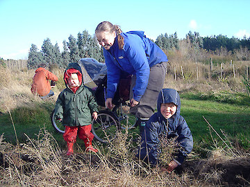 The Jacques family planting trees right at the beginning of the Bushy Point Project!